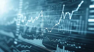 Financial data charts and graphs on a digital screen